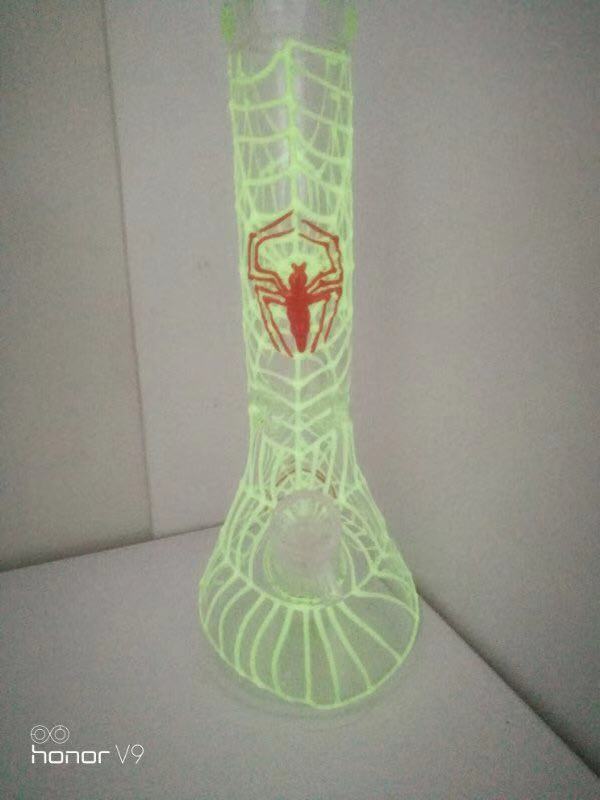 A spider's web Glowing Glass Beaker Bongs 