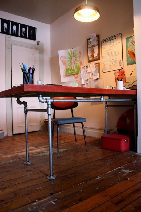 diy-desk-of-salvaged-door-and-pipes