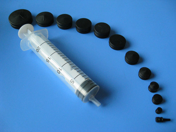 Syringe rubber piston