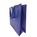 Sac en papier pour vêtements en feuille d&#39;or de couleur bleue