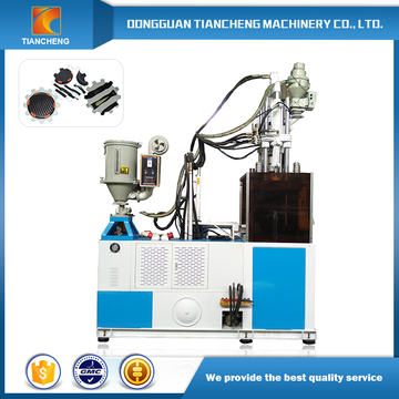 Single slide table vertical injection molding machines