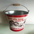 Bucket with wooden handle and bottle opener