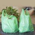 Les sacs de gilet non tissés écologiques réutilisables de catégorie comestible W coupent les sacs non tissés de T-shirt pour le shopping