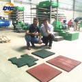 Machine de fabrication de carreaux de sol en caoutchouc