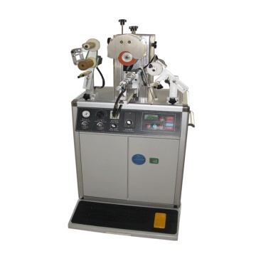 Bottle cap heat transfer machine