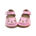 Dulce primera clase zapatos rosa huecos chillones bebé