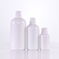 Opal white glass bottle with white lotion pump