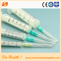 Plastic medical disposable syringe with needle