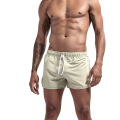 Shorts de praia masculinos por atacado que executam shorts esportivos