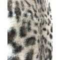 Casaco de pele falsa com estampa de leopardo