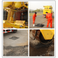 Road pothole repairing machine