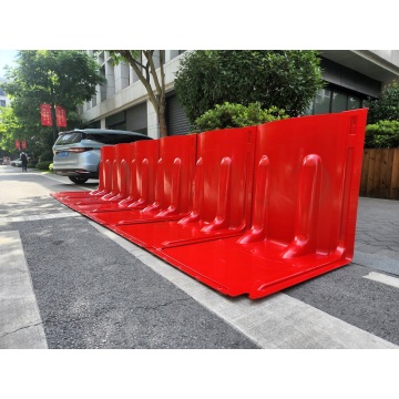 Portable flood barrier water treatment site flood gate