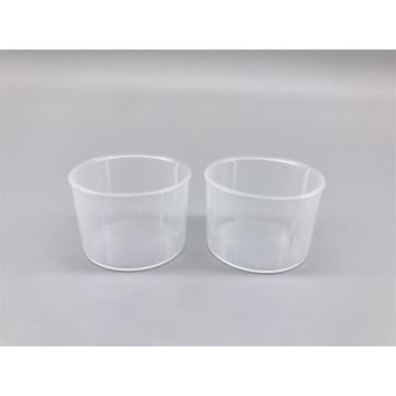 Laboratory tool with graduated medicine cup