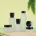 Cosmetic Frosted glass bottle with black caps