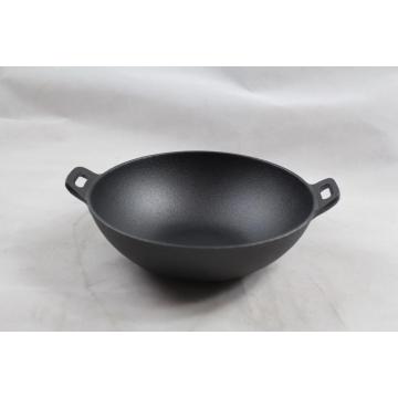 Cast iron wok with solid handle