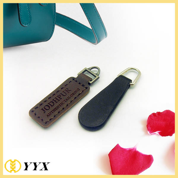 Genuine leather zipper puller with stamped logo