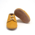 Commerce de gros jaune dentelle tout-petit selle bébé chaussures Oxford