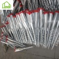 Factory ground earth screw anchor for fencing systems
