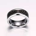 Tungsten carbide ring with carbon fiber inlay