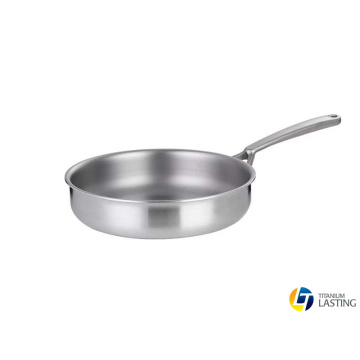 Titanio utensilios de cocina vuela pan tostado