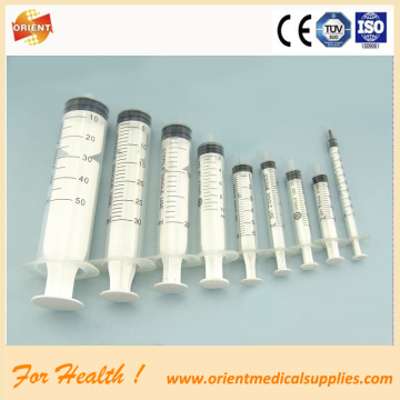 Plastic medical disposable syringe with needle