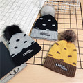 Warm winter knitted hat with fleece for children
