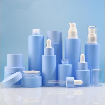 Ensembles de bouteille de crème et de lotion de crème bleu cosmétique Blue