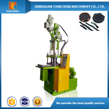 Sliding table vertical plastic making machine