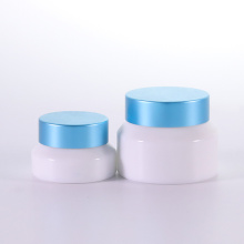 Opal white cream jar with blue cap