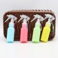 OEM ODM 50ml 60ml 100ml White Hair Water Empty Plastic Pocket Portable Trigger Sprayer Mini Spray Bottle With Keychain