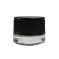 Empty glass jar with black plastic resistant lid