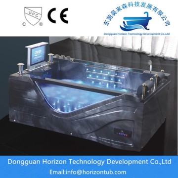 Glass freestanding hydromassage bathtub