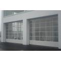Porte de garage coulissante acrylique sectionnelle transparente