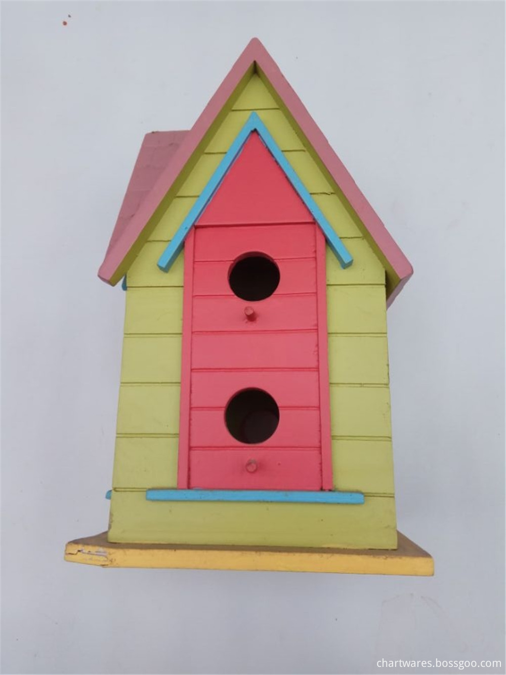 wooden bird house standing