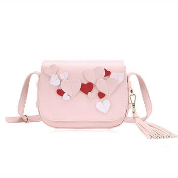 Three-dimensional love and tassel decoration shoulder bag