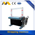 High speed strapping machine packing cartons