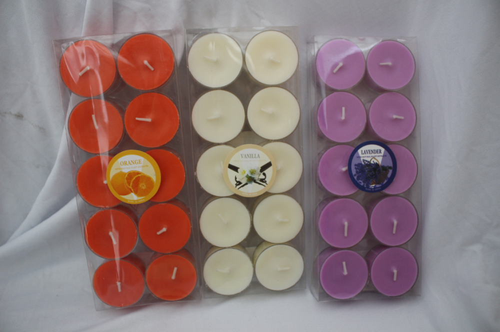 Colored tealight candle in pvc box packaging