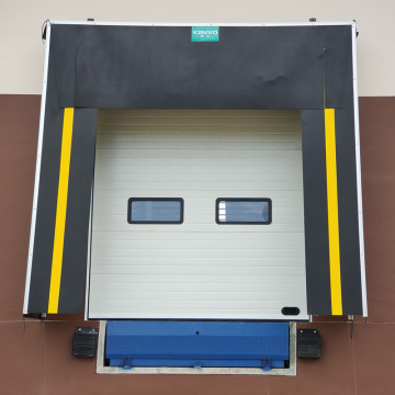 Hinged lip loading dock leveler