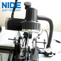 Automatic positioning armature dynamic balancing machine