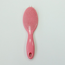 Peigne de brosse à cheveux rose résistant à la chaleur droite