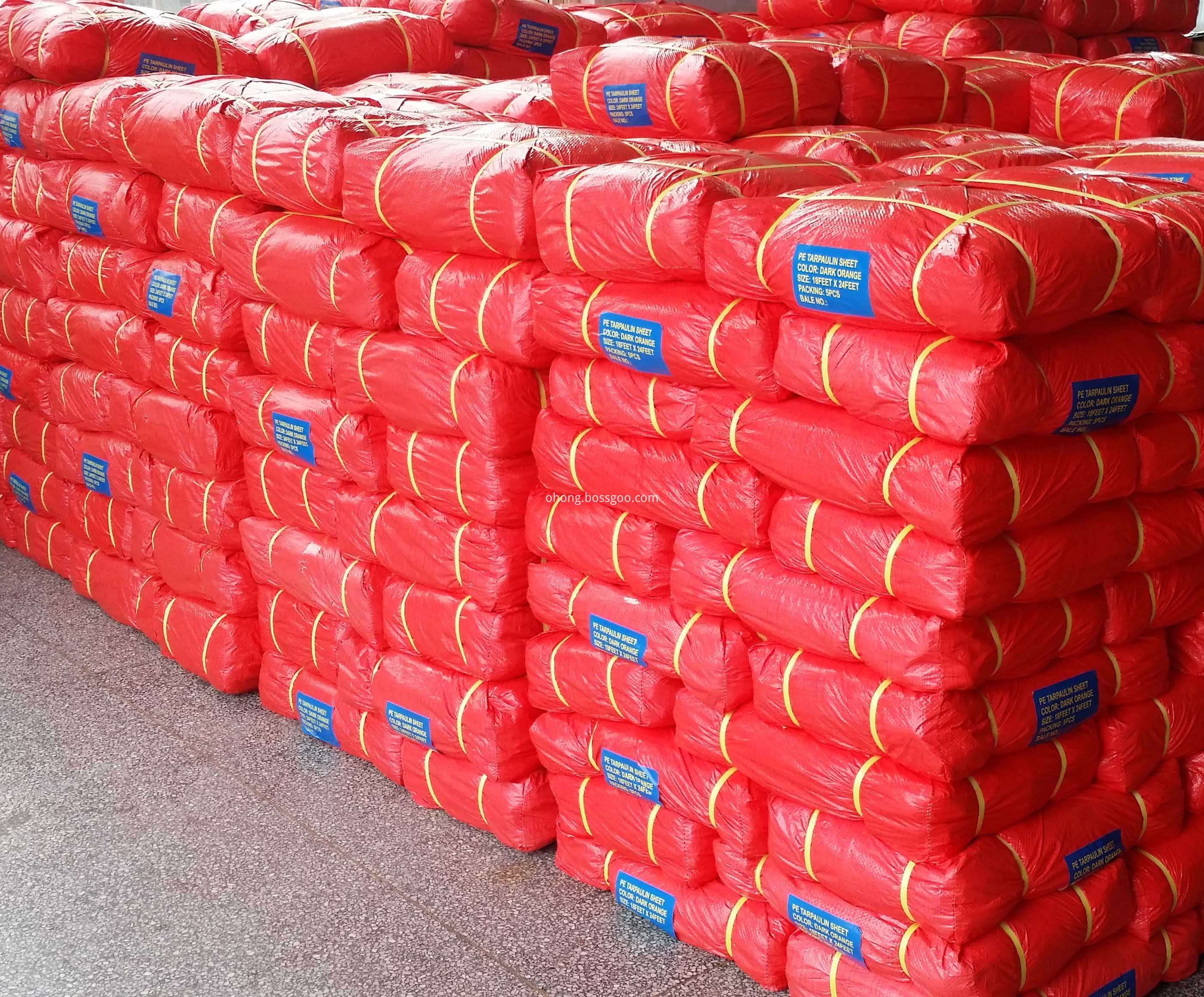 Orange Tarpaulin Bale Packing