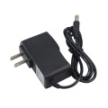 Adaptador de pared 12VDC0.5A con luz 5.5 * 1.7mm punta amarilla