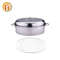 Stainless steel roasting pan with rack and lid