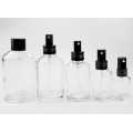 Slant glass lotion perfume bottle with pump head