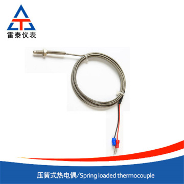 Thermocouple à ressort de compression fiable