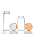 Botella de almacenamiento de vidrio de borosilicato alto con tapa de bambú