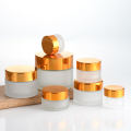 wholesale 10g 20g 30g 50g 100g sustainable transparent glass cosmetic jars frosted with silver lids