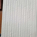 Imitation brick or stone insulated metal siding