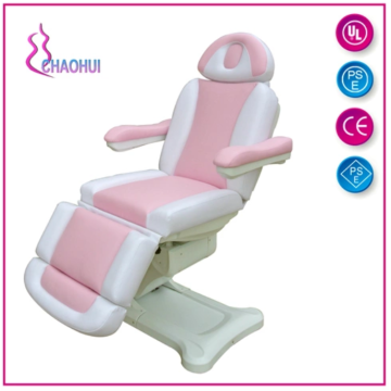 Elektrisches Massagebett rosa und weiß