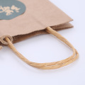 Gedruckter brauner Kraft -Hemd -Tasche mit Twist -Seil